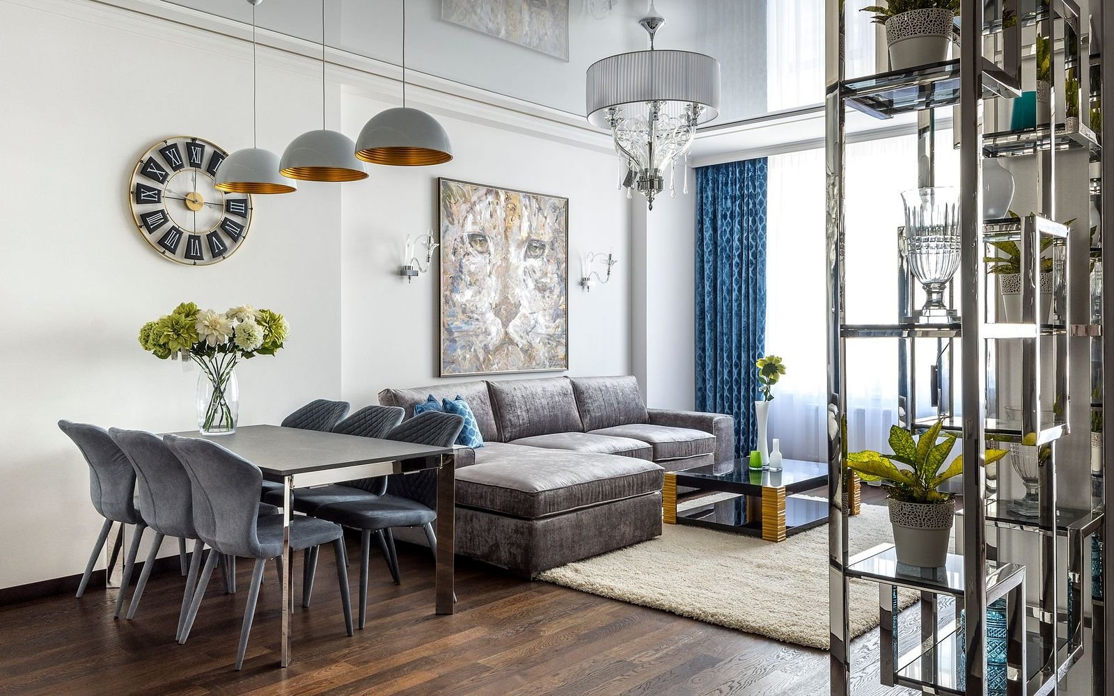 Dining and living area with pendant lights installed by an electrician